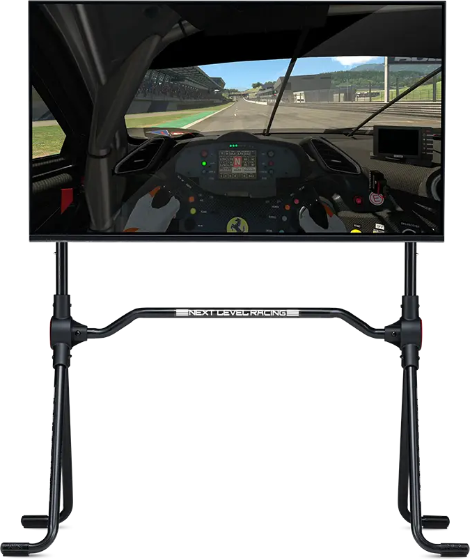 Stojak Next Level Racing Lite z monitorem zamocowanym nad poprzeczną belką.